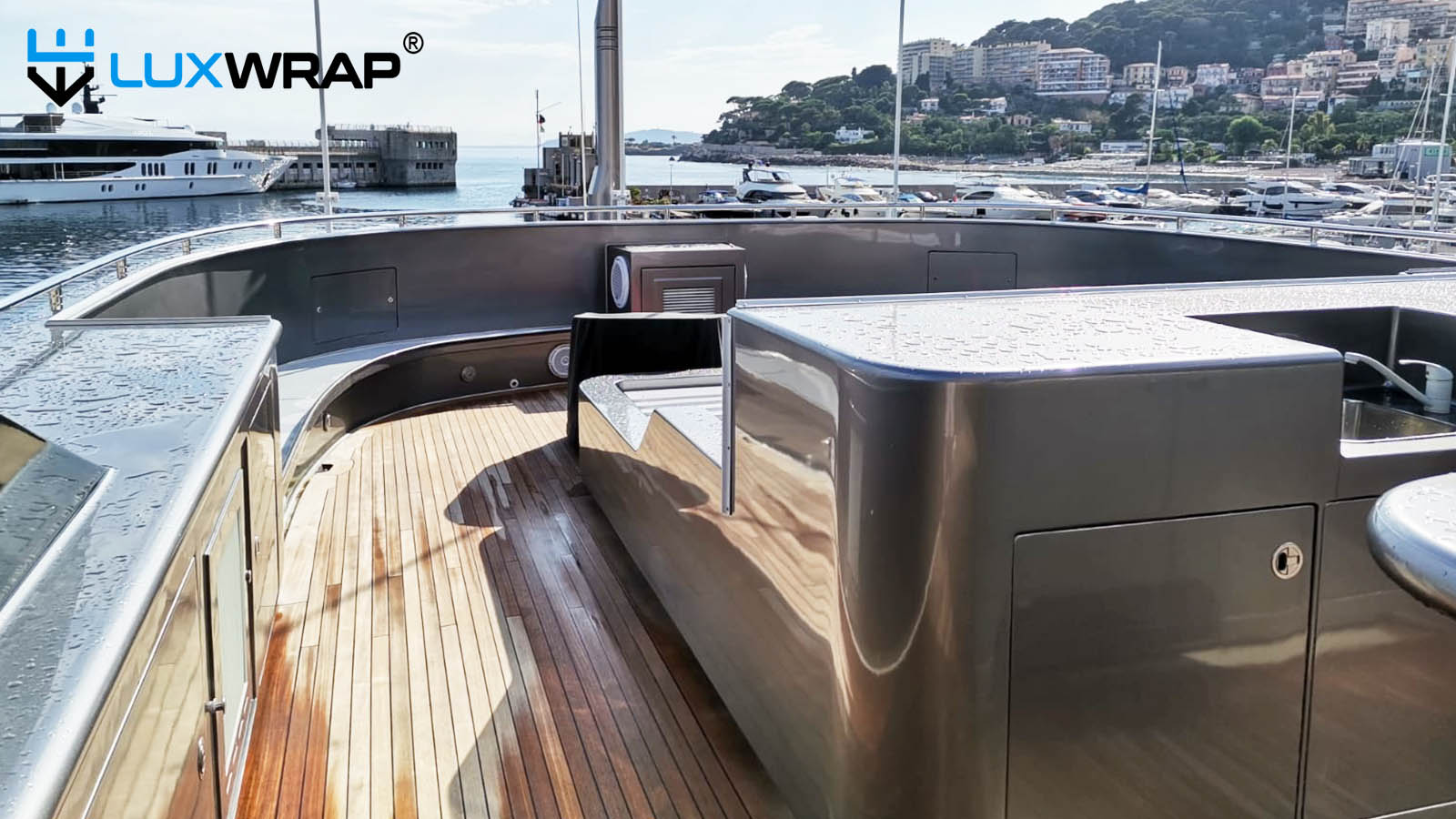 Entire yacht superstructures wrapped in metallic silver.