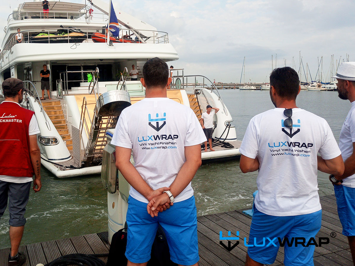 Dockmaster coordinating vessel movement and access for a superyacht wrapping project