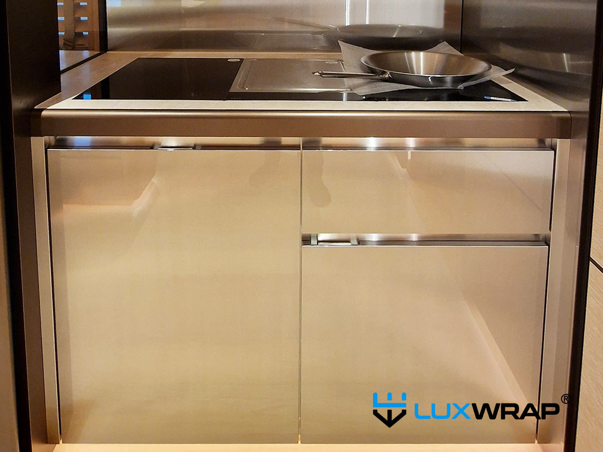 Textile-effect vinyl wrap installed around yacht basin taps by LuxWrap