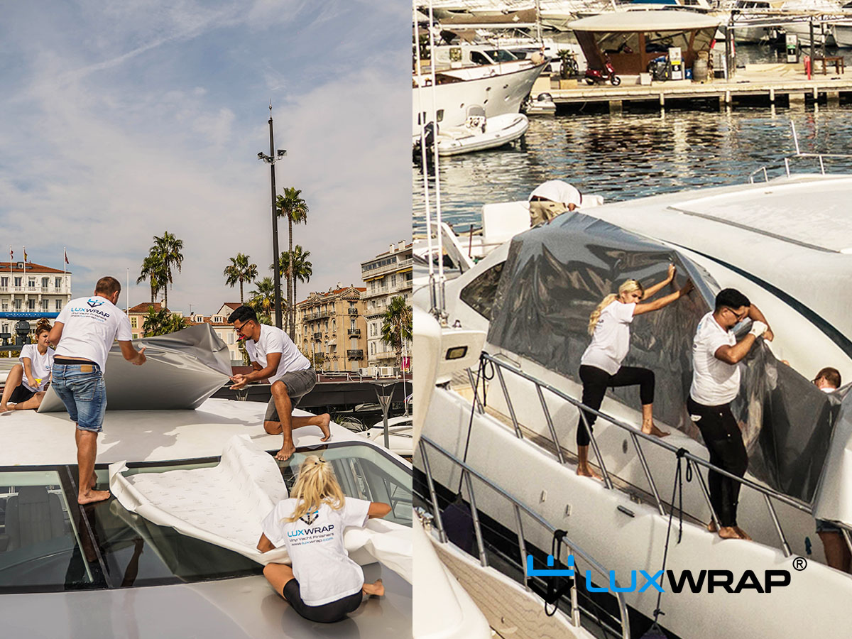LuxWrap installer using harness access to wrap a smaller yacht superstructure