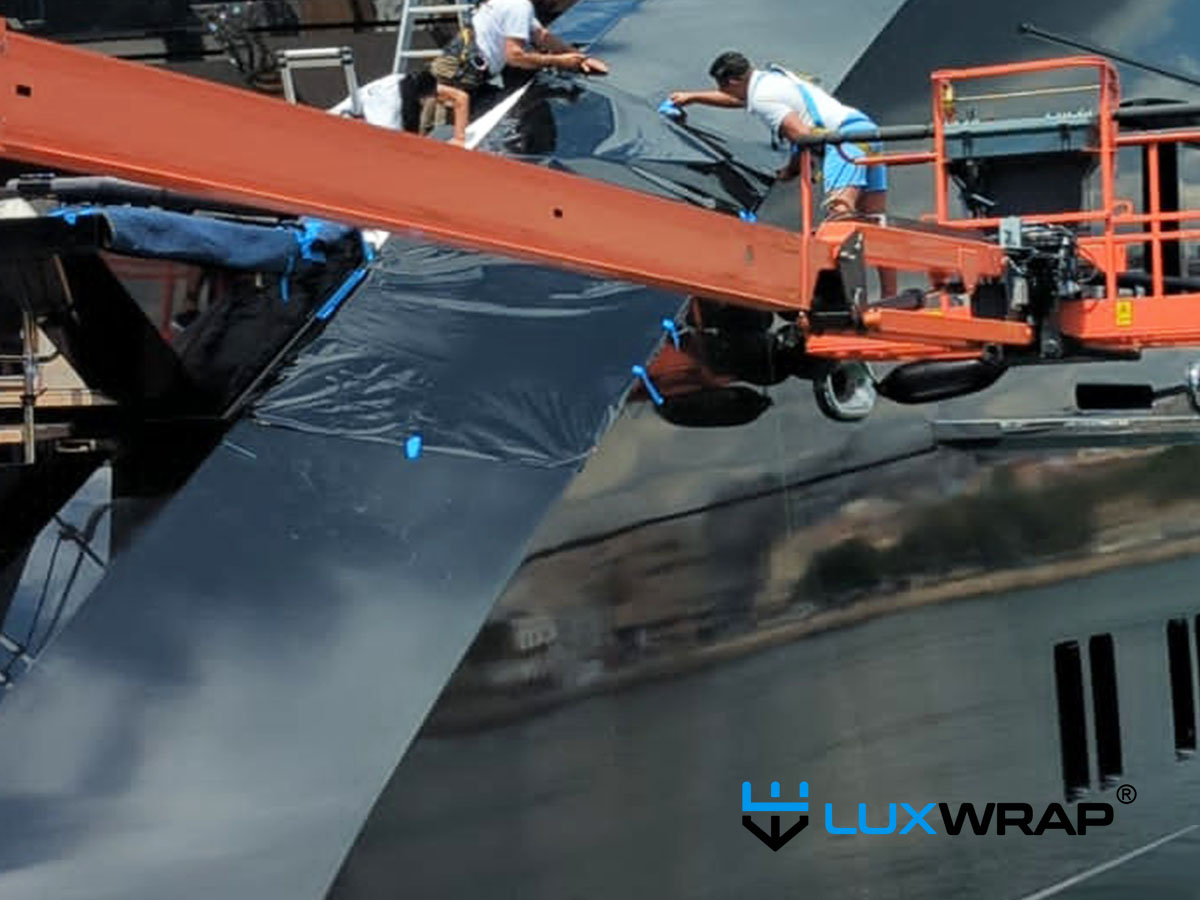Very large mega-yacht — vessels of this scale increasingly choose wrapping to protect new paintwork and reduce refit costs