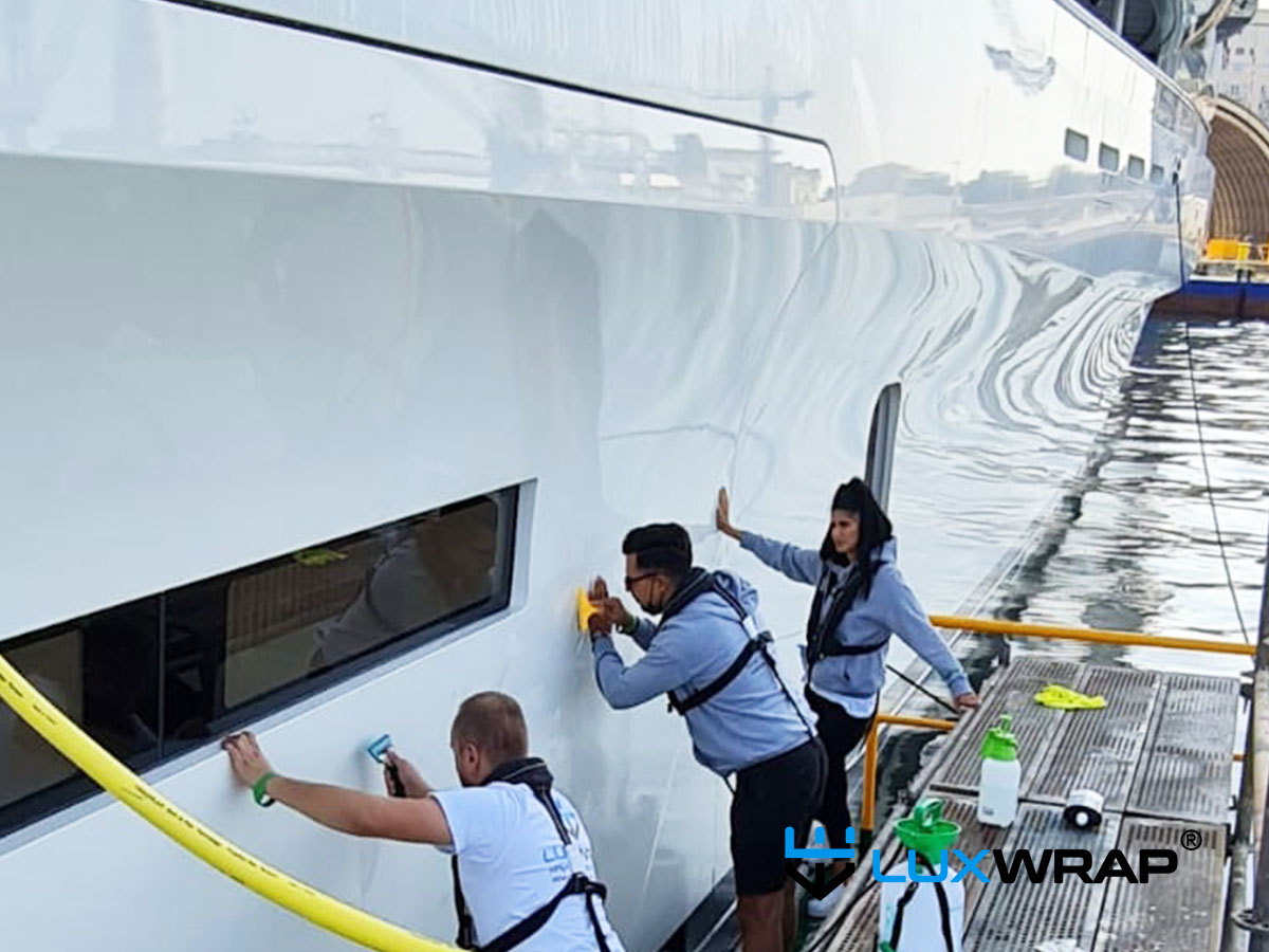 Gloss PPF applied to superyacht hull and garage doors