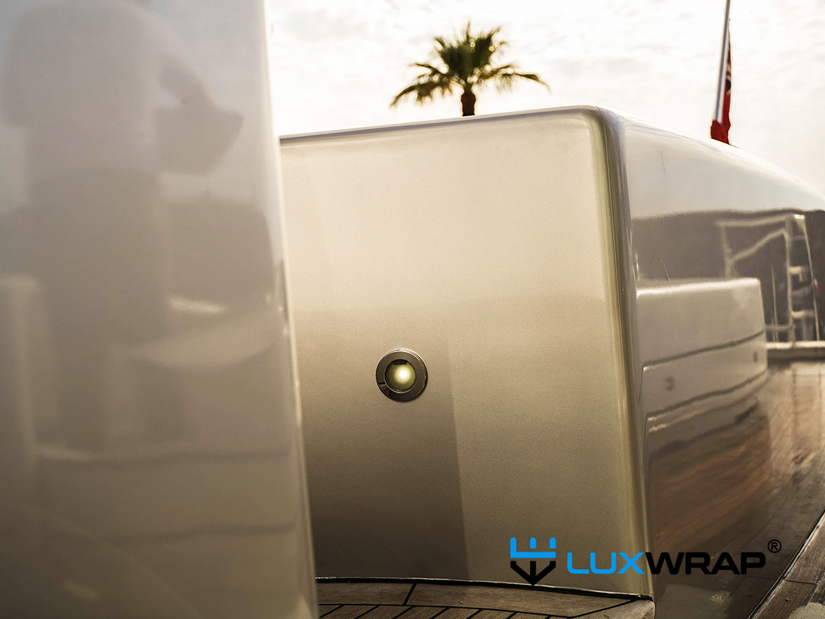 Exceptional high-gloss finish achieved when NinjaShield gloss PPF is applied over yacht wrapping vinyl